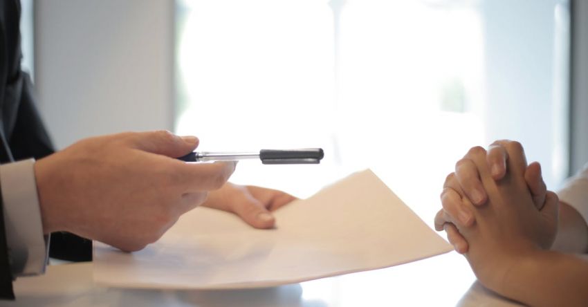 Elliptical Form - Crop businessman giving contract to woman to sign